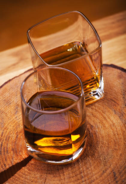 istock whiskey glass wooden background 1124800868