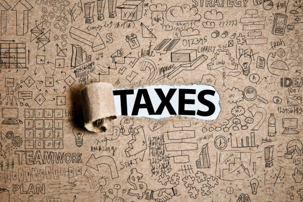 istock TAXES  /  Torn Paper Concept (Click for more) 1124800989
