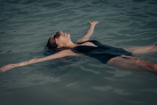 istock Happy woman at sea 1124801457