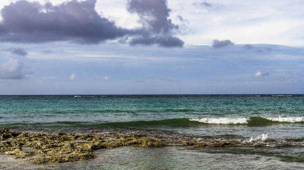 Storm clouds are gathering over the horizon of the Caribbean sea on the coast of Cuba.