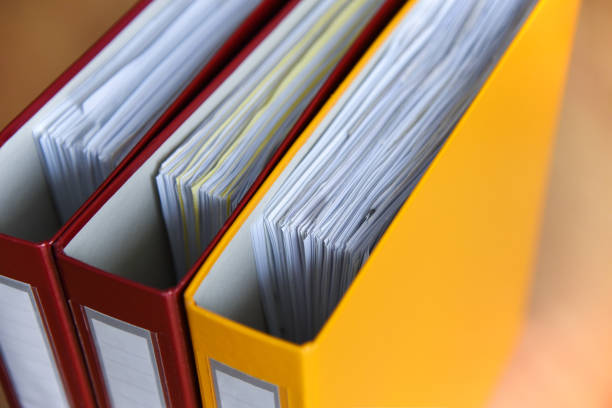 istock Large color folders for documents on the table in the office, close-up, copy space 1124801975