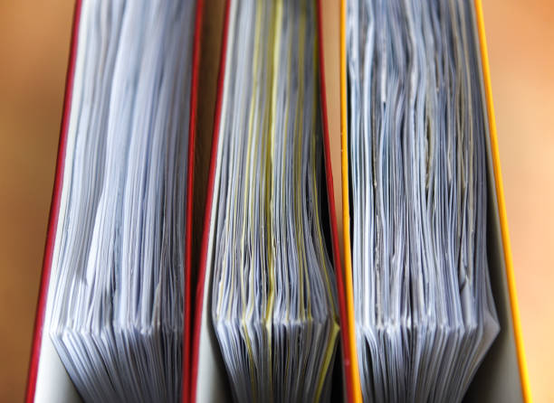 istock Large color folders for documents on the table in the office, close-up, copy space 1124802223