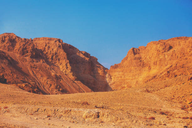 istock Mountain desert. Sandstone mountains against the blue sky 1124803614