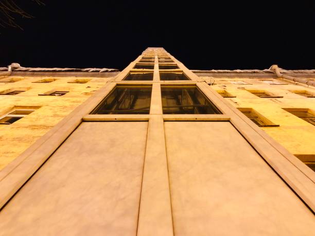 istock Retro and modern elevator shafts in one building 1124812294