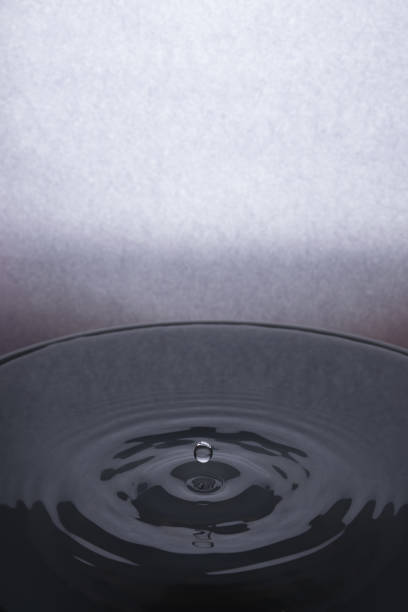 istock A drop of water breaks on the surface 1124812319