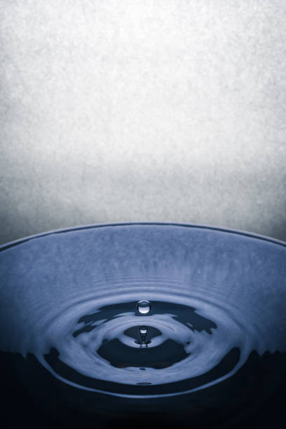 istock A drop of water breaks on the surface 1124813880