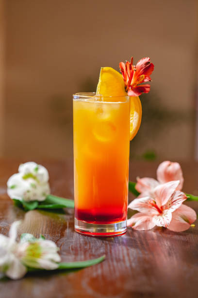 istock Tequila sunrise cocktail on wooden table. Close up 1124814705