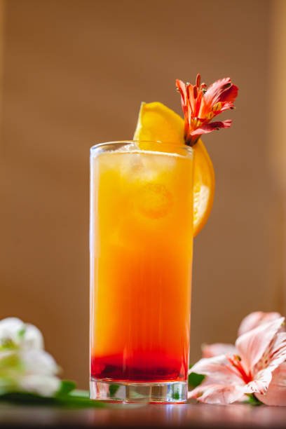 istock Tequila sunrise cocktail on wooden table. Close up 1124814717