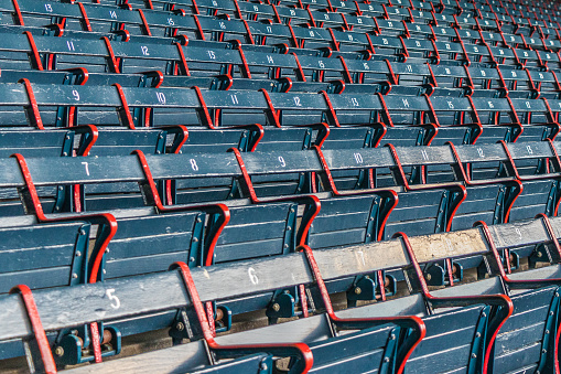 Old seats in the stadium are empty on this particular day