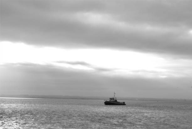 istock Tug Boat on River, Black and White 1124818132
