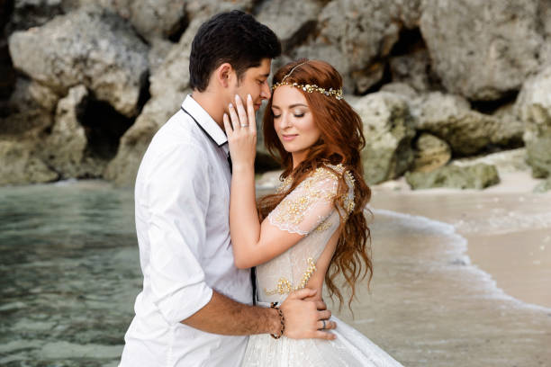 istock Newlyweds on the beach 1124824333