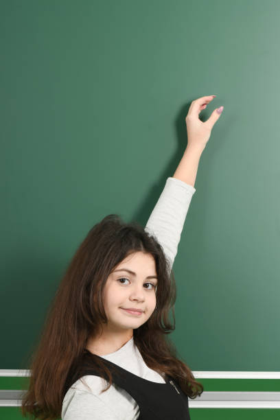 istock Smiling little schoolgirl 1124826580