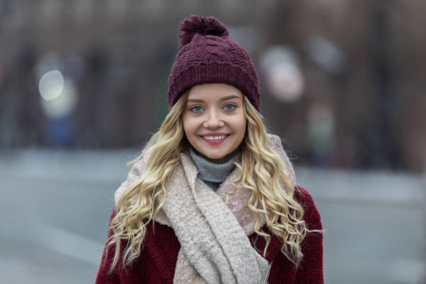 istock Blond young woman in street 1124827090