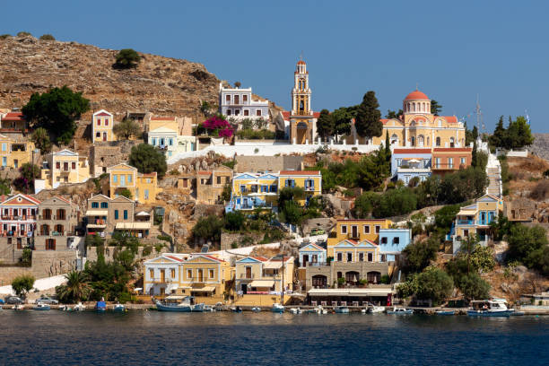 istock panoramic view of Symi in Greece with its church and tower 1124838593