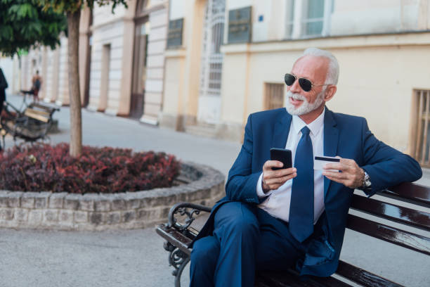 istock Happy businessman shopping online 1124838906