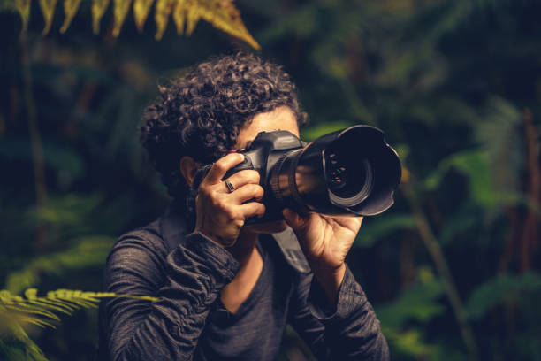istock Young Female Photographer 1124839932
