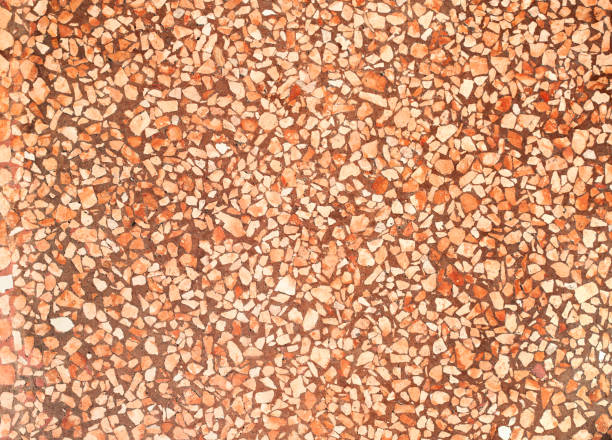 istock orange and dark red terracotta abstract mosaic background 1124841789