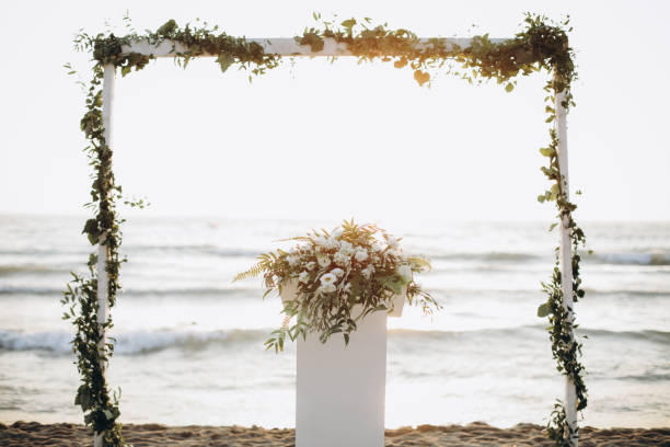 istock Beautiful wedding arch on the beach 1124852714