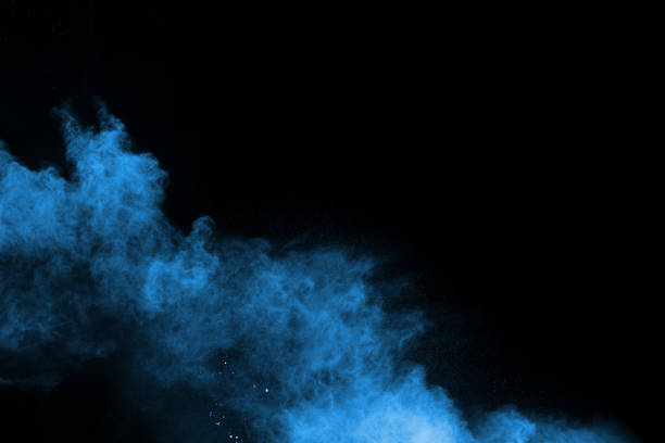 istock Blue powder explosion on black background. Colored cloud. Colorful dust explode. Paint Holi. 1124852809