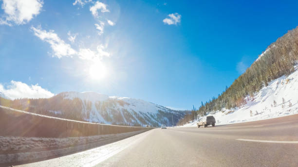 istock Drivign West on interstate highway I70 through the mountains 1124869960