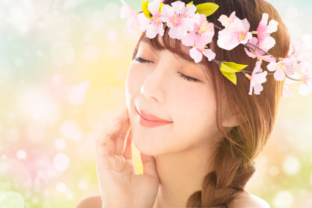 istock closeup young beauty face with spring background 1124881969