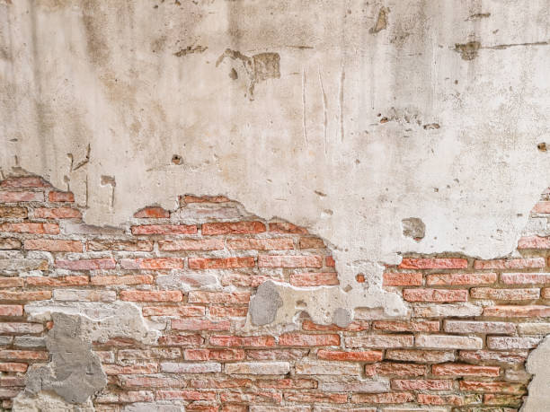 istock Old brick wall in antiquity and was damaged 1124883803