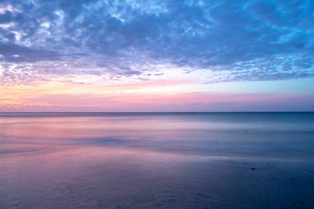 istock Stunningly vibrant sunset over the ocean 1124887602