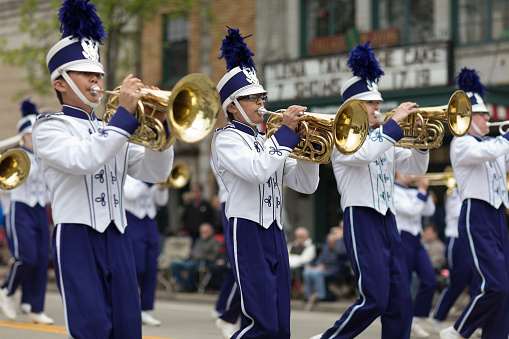 Stoughton, Wisconsin, USA - May 20, 2018: Annual Norwegian Parade, Members of the Stoughton High School Marching band, performing during the parade