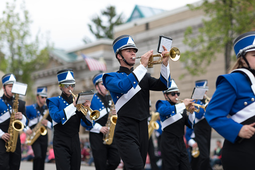 Stoughton, Wisconsin, USA - May 20, 2018: Annual Norwegian Parade, Members of the Evansville High School Band, performing during the parade