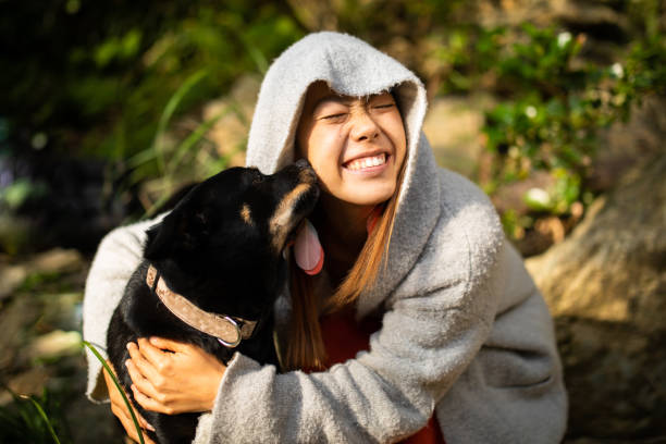 Loving kisses from her dog