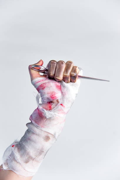 istock Halloween theme: an image of zombie hands with black nails 1124930521