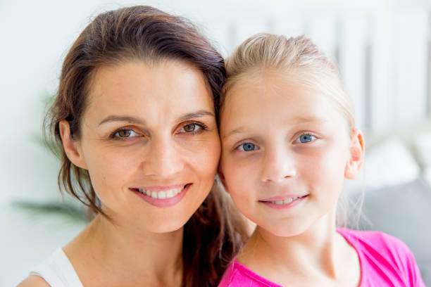 istock mother and daughter are spending time together at home 1124933285