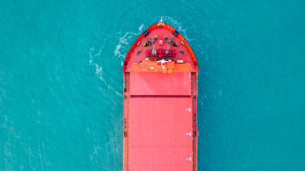 istock Large Red general Cargo ship anchored at sea 1124933350