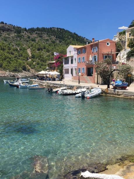istock Clear blue sea and boats at Assos 1124940724