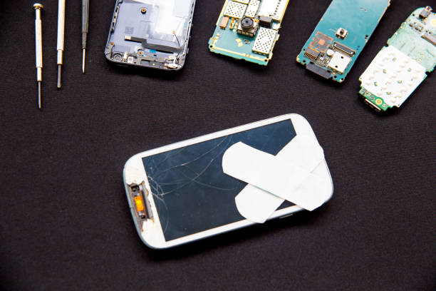 istock smartphone parts and repairing tools, flat lay, top view 1124941913