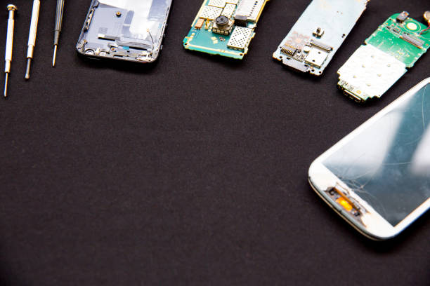 istock smartphone parts and repairing tools, flat lay, top view 1124941928