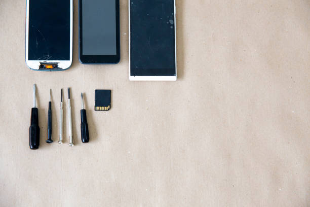 istock smartphone parts and repairing tools, flat lay, top view 1124942032