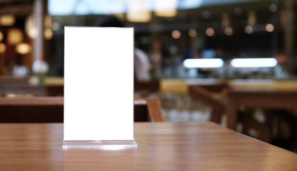 istock Menu frame standing on wood table in Bar restaurant cafe. space for text marketing promotion. 1124942911