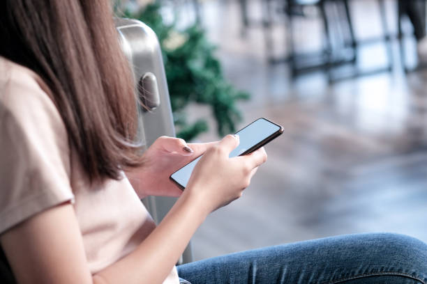 istock Young beautiful female traveler using smart phone. 1124942997