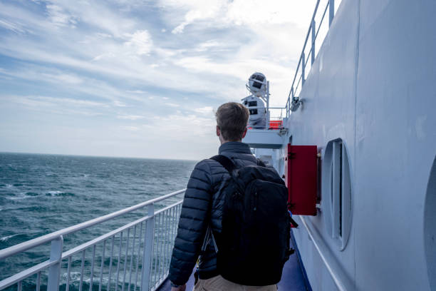 istock Young Male on a large ship on adventures (2) 1124945860