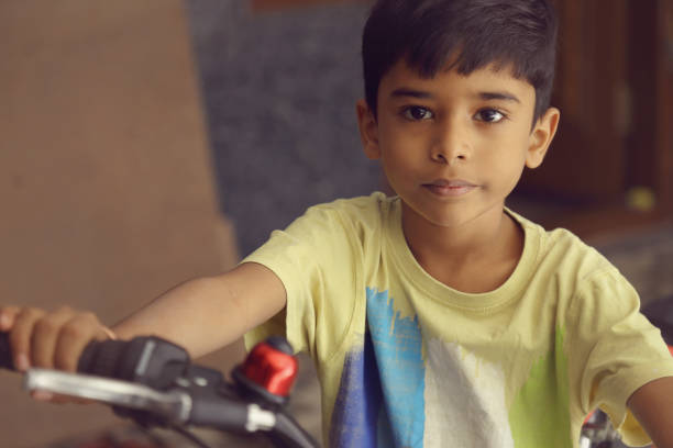 istock Indian Little Boy with Cycle 1124950046