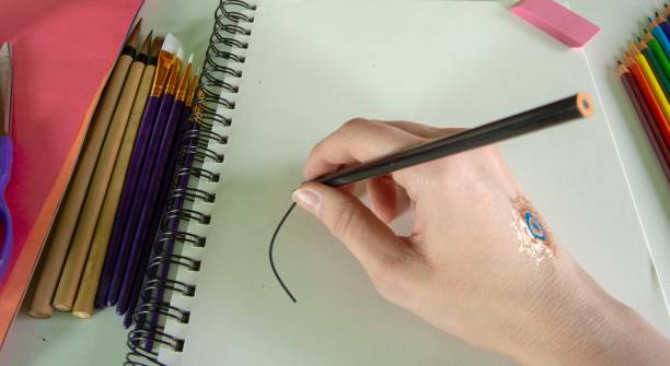 istock Hand drawing on sketch paper 1124951518