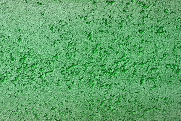 istock nice vintage green limestone like stucco texture for design purposes. 1124952482