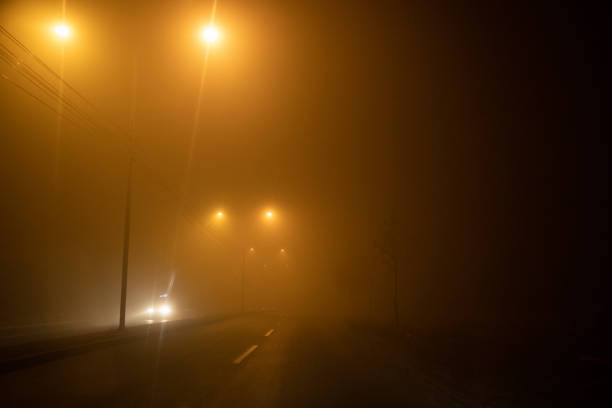 istock Road trip at foggy night 1124953672
