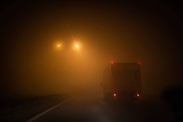 istock Road trip at foggy night 1124953829