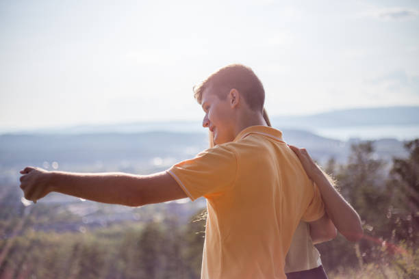 istock Two hikers taking selfie on top of the mountain 1124953857