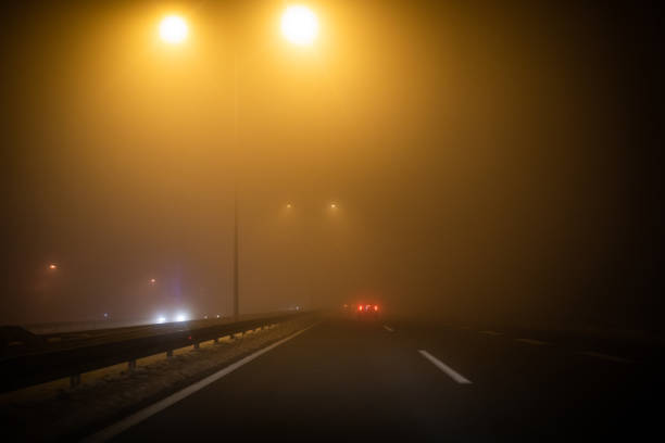 istock Road trip at foggy night 1124954580