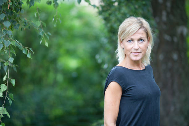 istock blond woman portrait 1124954681