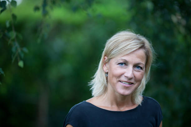 istock blond woman portrait 1124954690