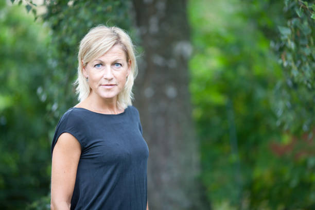 istock blond woman portrait 1124954693